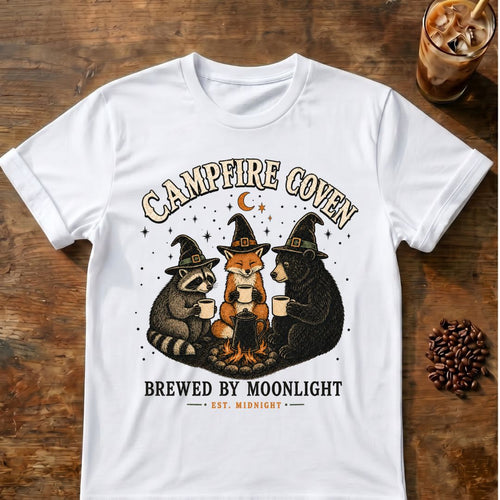 Raccoon coffee graphic for Campfire Coven Coffee on white T-shirt