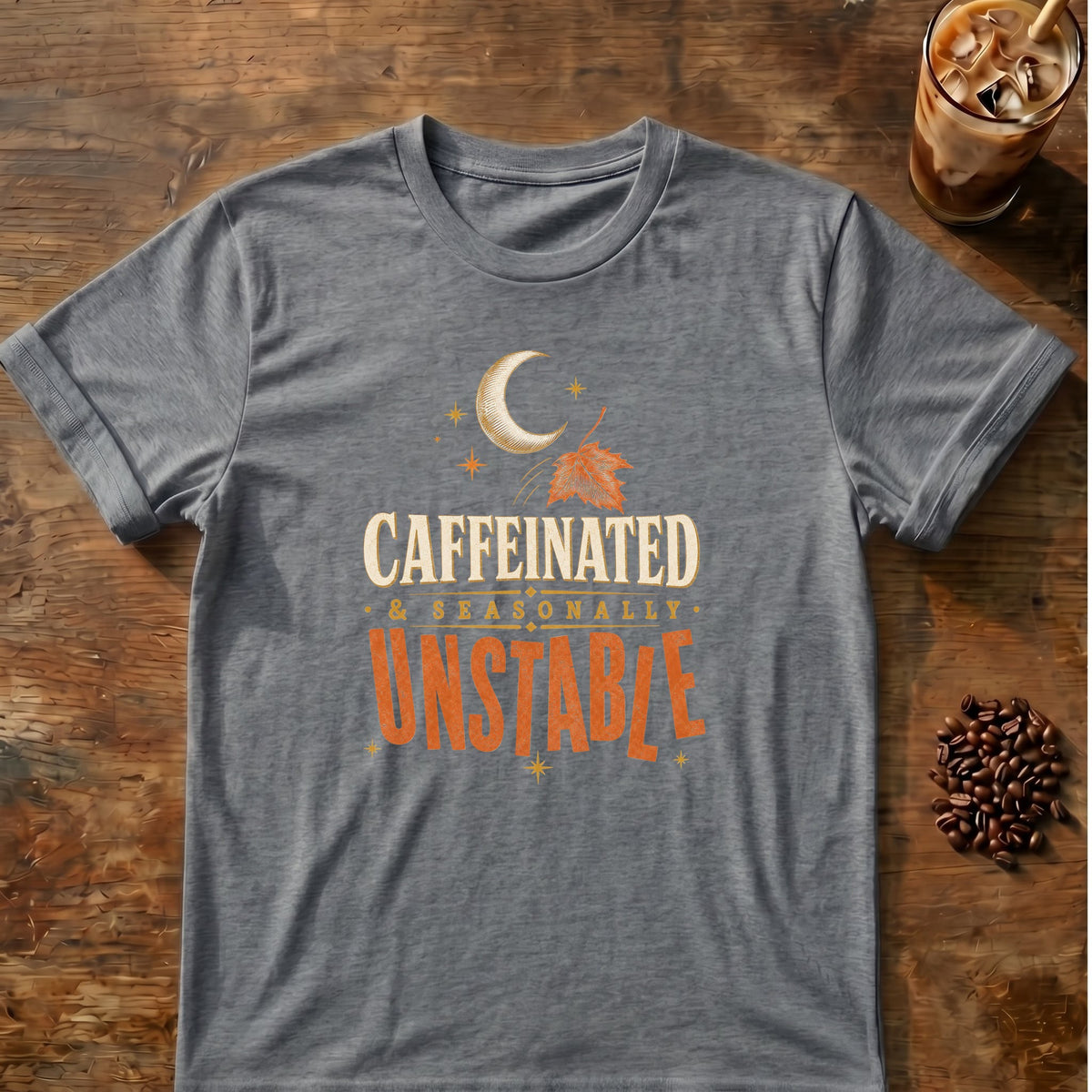 Typography graphic for Caffeinated & Seasonally Unstable on graphite-heather T-shirt