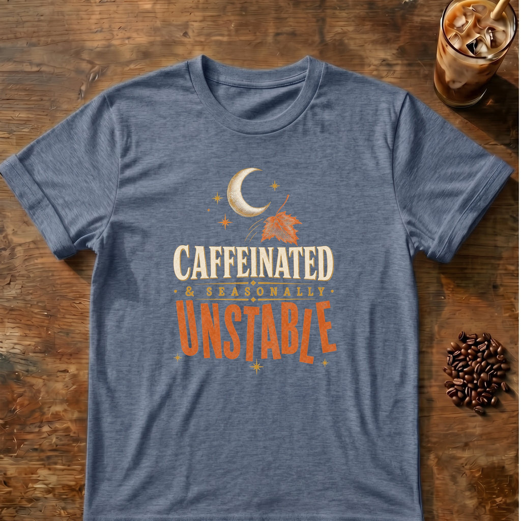 Typography graphic for Caffeinated & Seasonally Unstable on heather-indigo T-shirt